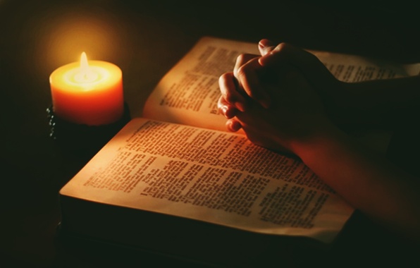 bible-candle-praying-hands